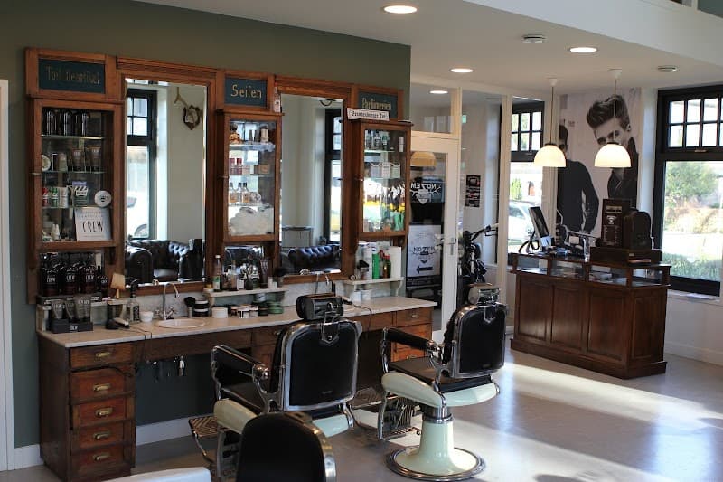 Nozem Barbers & Tattoo