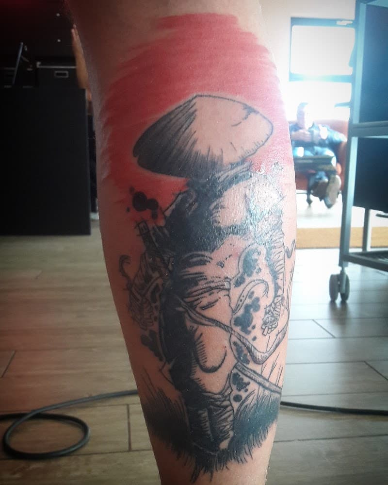 Illustratieve samoerai met rode zon op onderbeen.