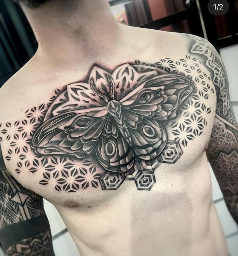 Reinkarnation Tattoos & Piercings