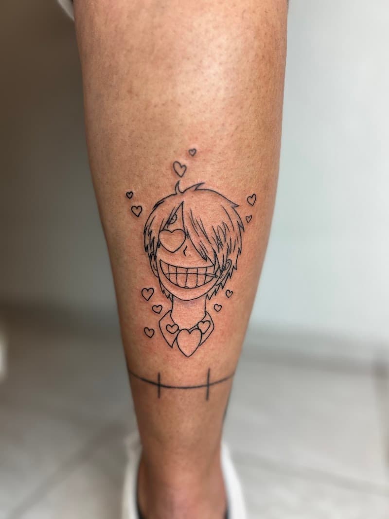 Fineline tattoo van Sanji uit One Piece met hartjesogen op onderbeen.