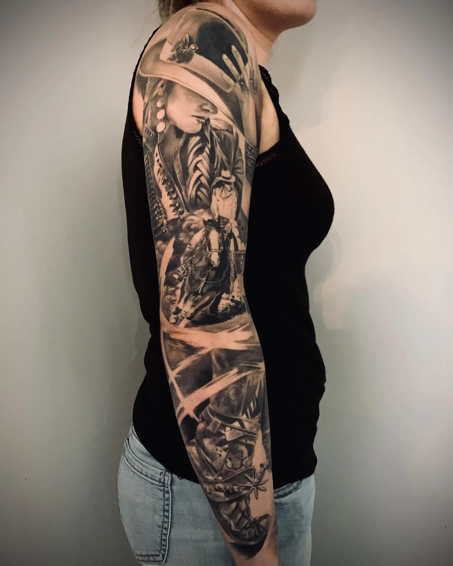 Realistische western sleeve met cowgirl, paard en laars.