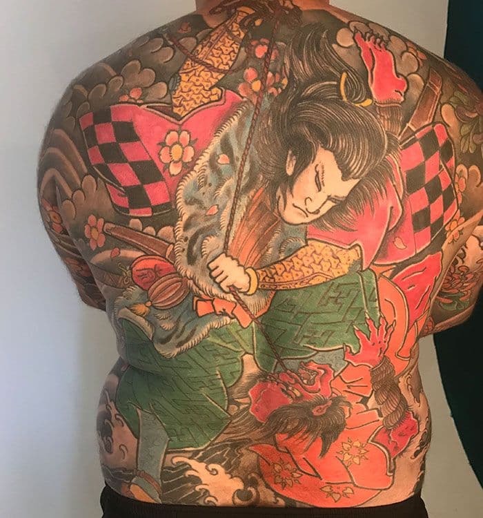 Grote Japanse full-back tattoo van een samoerai die een demon bevecht.