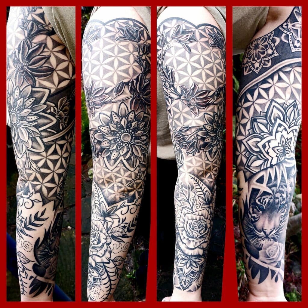 Zwart-wit sleeve met mandala's, bloemen, geometrische patronen en een tijger.