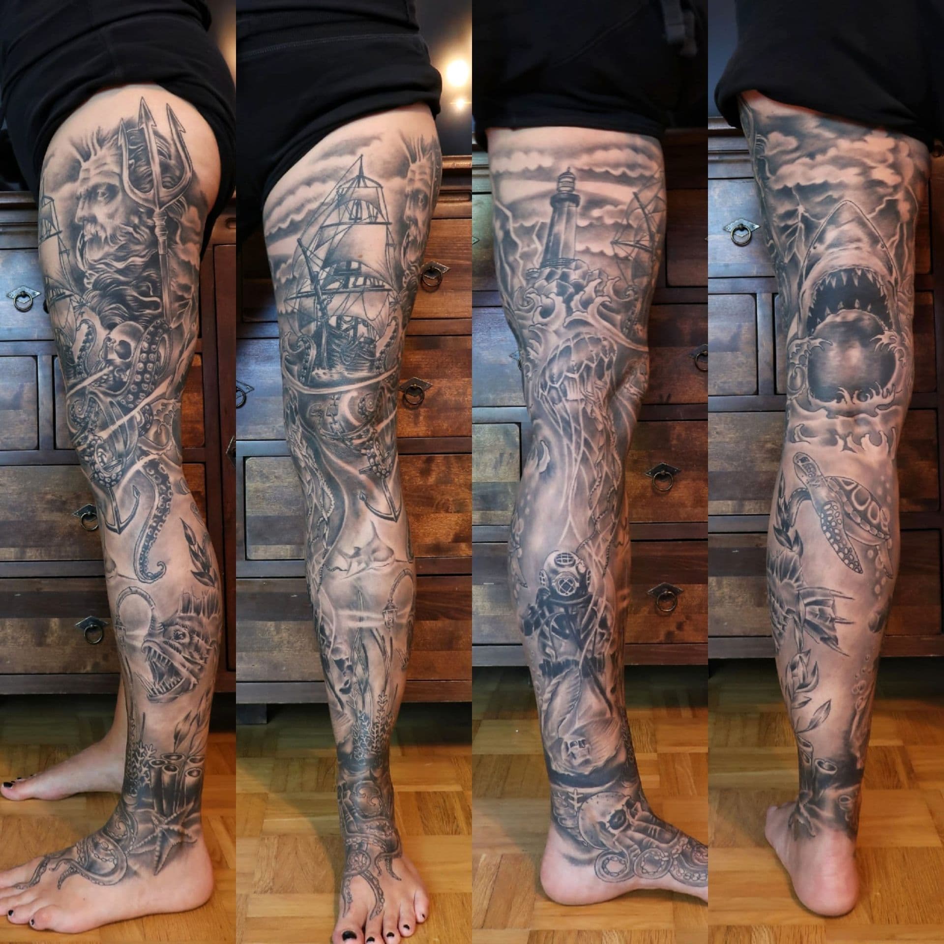 Grote zwart-wit been sleeve met Poseidon, schip, haai en vuurtoren.