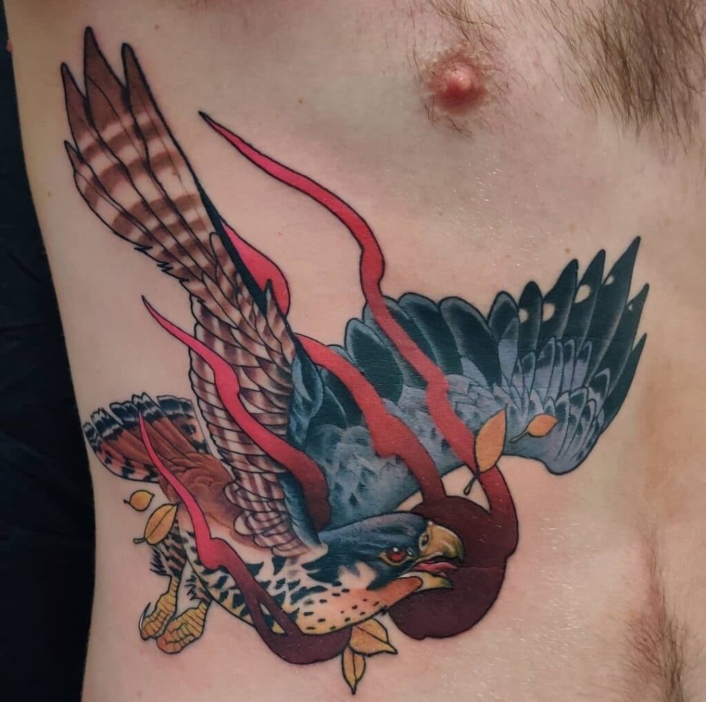 Neo-traditionele valk met rode linten op de ribben.