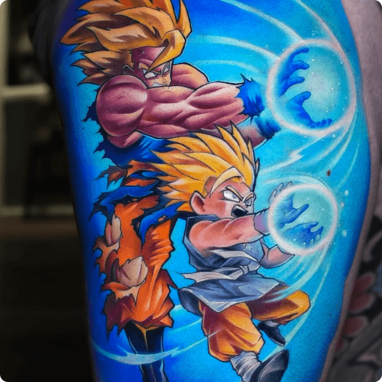 Kleurrijke Dragon Ball Z tattoo van Goku en Gohan die een Kamehameha uitvoeren.